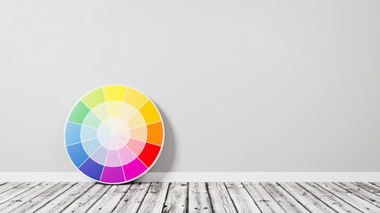 Color Wheel on Wooden Floor Against Wall - obrazy, fototapety, plakaty