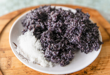 Traditional Chinese food cooked on a plate - black rice