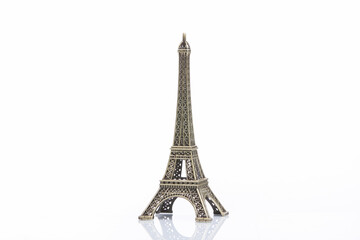 Fototapeta na wymiar Eiffel tower miniature isolated on white background