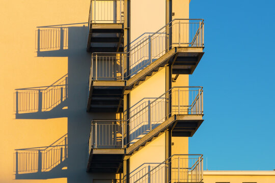 facade of a residential building with exterior staircase