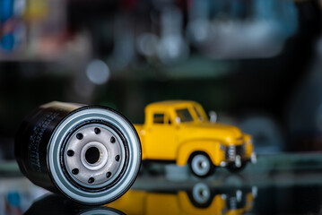 Fototapeta premium Automotive engine oil filter replacement for cars in the shop, Automotive Parts.
