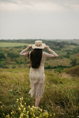 A girl in a hat in nature