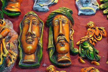 image of wooden face of indian farmer.