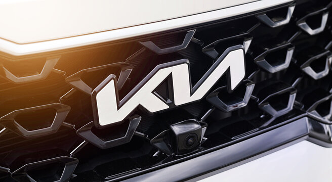 Poznan, Poland April 15, 2022. KIA Motors new angular logo on of Kia Rio. Chrome KIA logo close up