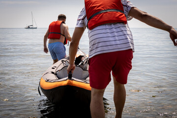 Inflatable canoe launch at sea