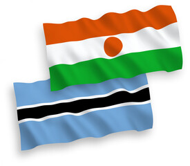 Flags of Republic of the Niger and Botswana on a white background