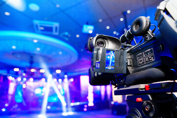 broadcast video camera to show what is happening on stage on large screens. 