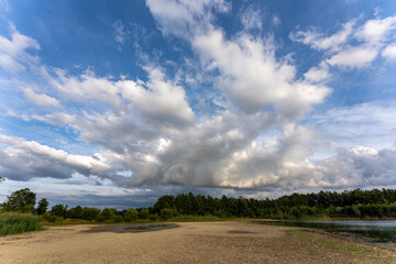 Storm clouds with rain, severe weather and dramatic clouds nature background Germany Bavaria. climate change with storms.