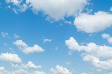Blue sky with cumulus clouds at daytime. Natural panoramic background photo texture