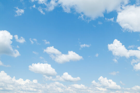 Blue sky with cumulus clouds at daytime. Natural panoramic background photo texture