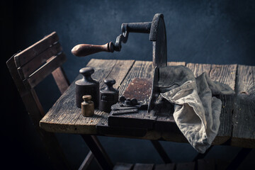 Rustic and old slicer and metal weights.