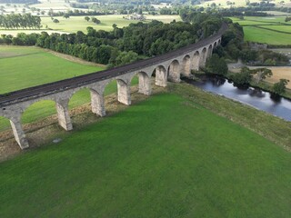 Fototapeta na wymiar Arthington Victorian Viaduct, also known as Castley Viaduct or Wharfedale Viaduct, railway bridge crossing the Wharfe valley. Arthington in West Yorkshire