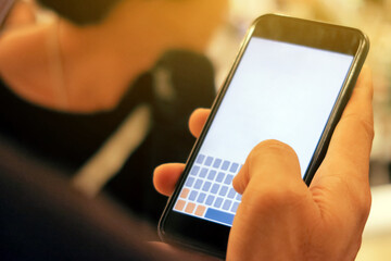 Closeup Image of man checking his phone