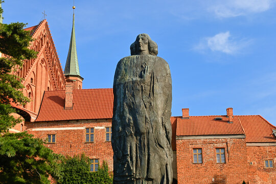 Frombork, Poland - August 15, 2022: Nicolaus Copernicus monument. The Cathedral complex in Frombork, a historical monument museum of medieval buildings.