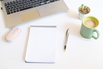 notebook with pen and coffee