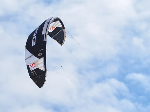 Core kite surfing umbrella at the blue sky