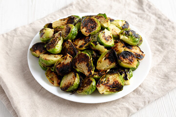Homemade Roasted Brussel Sprouts on a Plate, side view.