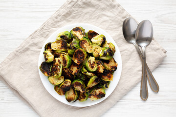 Homemade Roasted Brussel Sprouts on a Plate, top view. Flat lay, overhead, from above.