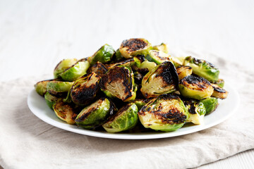 Homemade Roasted Brussel Sprouts on a Plate, side view.