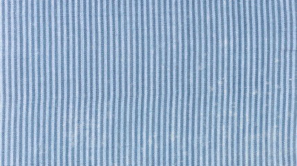 Blue striped textile background. Full frame