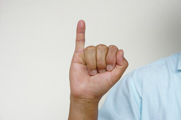 Closeup hand sign gesture.   Concept : Body sign Language to teach or communicate with deaf disabled. Education for handicaps . 