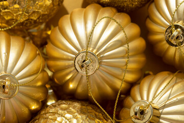 macro detail of beautiful shiny golden Christmas baubles