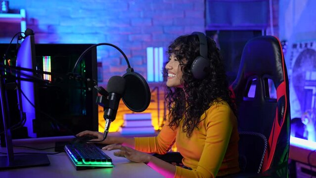 Streaming concept of 4k Resolution. Asian woman recording singing in studio. live broadcast online.