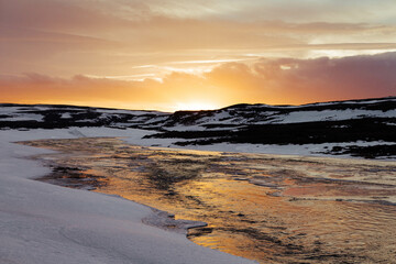 Sunset sunrise water reflection iceland arctic frozen ice.