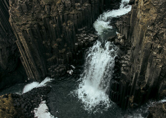 Fototapeta premium Famous Litlanesfoss waterfall near Hengifoss, in eastern Iceland.
