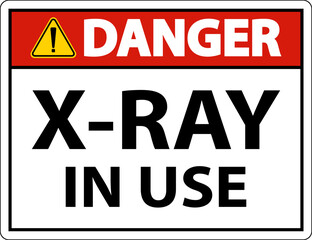 Obraz premium Danger X-Ray In Use Sign On White Background