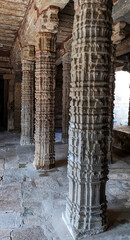 Intricate stone worked pillars of an ancient Kumbakonam temple, Tamil Nadu, India