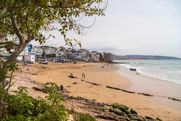 view of the beach of Taghazout village in the morning, Agadir Morocco