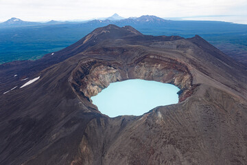 Volcano Maly Semyachik with an acid lake in the crater. Kamchatka, Russia. © efonin