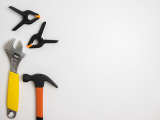 Top view of construction tools and tools highlighted on a white background with a space in the...