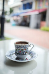 a cup of turkish coffee on table outdoor 