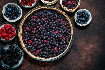 Homemade fresh round cake tart with berries, raspberries, blackberries