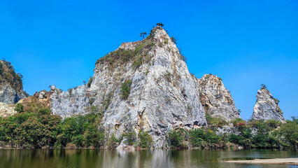 Fototapeta na wymiar Big stone mountain at Khao Ngu Stone Park, Ratchaburi, Thailand
