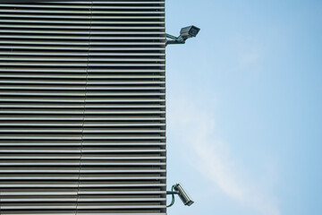 security camera on blue sky
