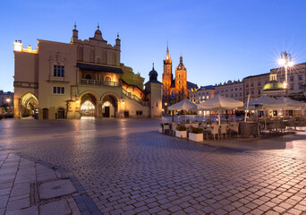 Fototapeta na wymiar Krakow. Market square in the night lights at sunrise.