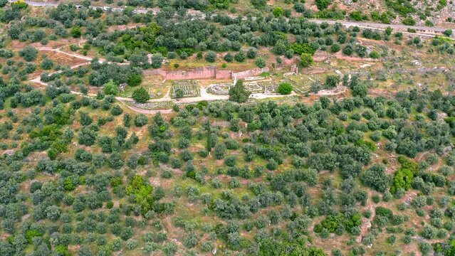 Travel to Greece and explore historic sites. Delphi archeology and landmark