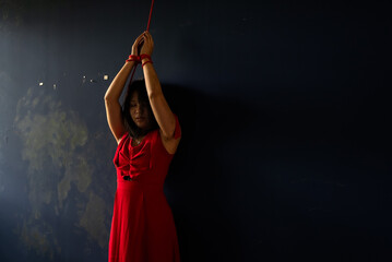 An Asian woman was kidnapped by an assailant to pay a ransom. Harassment, Violence.