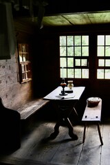 interior of an old dark  living room cottage house