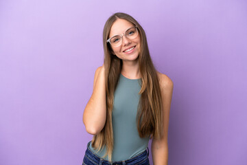 Young Lithuanian woman isolated on purple background laughing