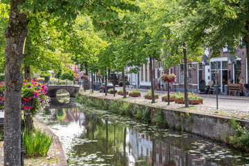 Fototapeta na wymiar Narrow canal in the center of the Dutch medieval city of Amersfoort.