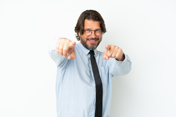 Senior dutch business man isolated on white background points finger at you while smiling