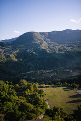 landscape with mountains and football field
