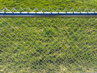 backyard chainlink fence chain steel security yard grass lawn metal fencing