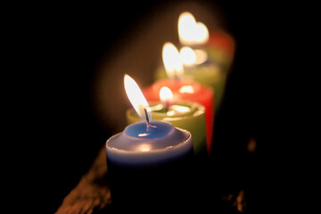 burning candle in the dark