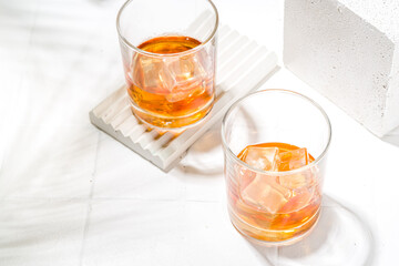 Iced whiskey in short glasses