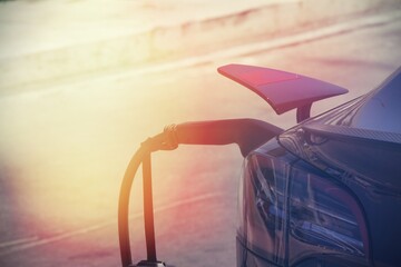Shot of a car at a charging station , concept of electric car.